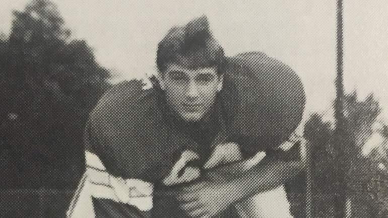 Curtis Lovelace as a football star at Quincy High School