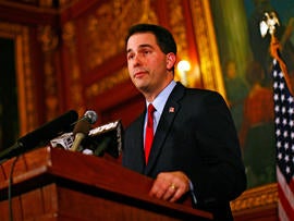 Republican Gov. Scott Walker speaks at a news conference inside the Wisconsin State Capitol