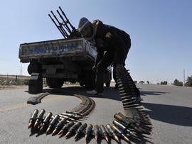 Rebel fighter mans anti-aircraft gun near Ajdabiya, Libya