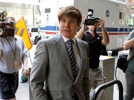 Former Illinois Gov. Rod Blagojevich arrives at a federal courthouse for a hearing in Chicago July 15, 2011. It is Blagojevich's first time in court since a jury convicted him of multiple corruption counts in June. Judge James Zagel warned Blagojevich that he could lose his Chicago home and a condo in Washington if he tried to flee or otherwise violated his bond terms.