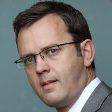 Director of Government Communications Andy Coulson, a former News of The World editor, leaves his house Sept. 9, 2010, in London. Photo credit: Getty Images