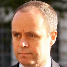 John Yates, an assistant commissioner in the Metropolitan Police Service and head of its specialist operations, arrives at the Cabinet Office Oct. 30, 2010, in London. Photo credit: Getty Images