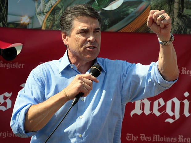 DES MOINES, IA - AUGUST 15: Republican presidential candidate and Texas Governor Rick Perry speaks to visitors at the Iowa State Fair August 15, 2011 in Des Moines, Iowa. The visit is part of Perry's first campaign trip to Iowa since declaring he would seek the Republican nomination for president on August 13.