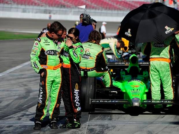 LAS VEGAS - OCTOBER 16: Danica Patrick, driver of the #7 Andretti Autosport Dallara Honda, is consoled by a crew member after Dan Wheldon of England was pronounced dead after he was involved in a 15 car massive crash during the Las Vegas Indy 300 part of the IZOD IndyCar World Championships presented by Honda on October 16, 2011 at the Las Vegas Motor Speedway in Las Vegas, Nevada. (Photo by Robert Laberge/Getty Images)