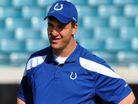 Quarterback Peyton Manning of the Indianapolis Colts looks on before the kickoff against the Jacksonville Jaguars Jan. 1, 2012, at EverBank Field in Jacksonville, Fla.