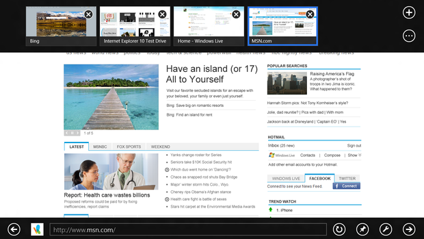 Swipe up from the bottom edge of an app and you'll get app-specific controls. In the case of IE 10, this means your URL bar on the bottom and tabs thumbnails on top.