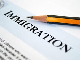 Close up of pencil on immigration application form.