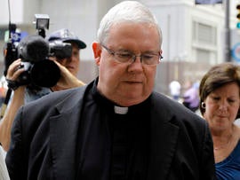 Monsignor William Lynn walks to the Criminal Justice Center June 22, 2012, in Philadelphia.