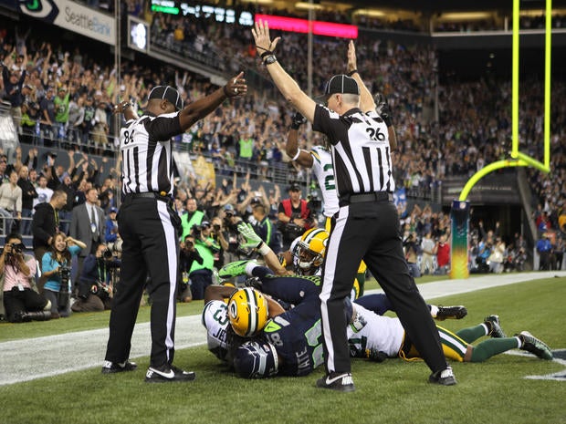 Wide receiver Golden Tate of the Seattle Seahawks makes a catch in the end zone to defeat the Green Bay Packers on a controversial call by the officials at CenturyLink Field on September 24, 2012, in Seattle.