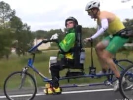 Brent and Kyle Pease compete in long course triathlon.