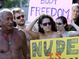 Demonstrators gather outside of City Hall in San Francisco for a protest against a proposed city-wide nudity ban, Wednesday, Nov. 14, 2012.