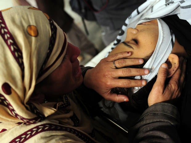 A Pakistani mother mourns her daughter, who was killed working for a polio vaccination program