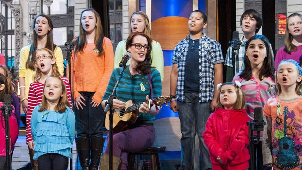 Ingrid Michaelson accompanied by children from Newtown, Conn. and Sandy Hook Elementary school perform "Somewhere Over the Rainbow" on ABC's "Good Morning America" on Tuesday, Jan. 15, 2013 in New York.