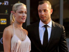 South African Olympic athlete Oscar Pistorius and his girlfriend Reeva Steenkamp are seen at an awards ceremony in Johannesburg Nov. 4, 2012.
