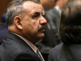 Oscar Hernandez, former mayor of Bell, Calif., listens to closing arguments in a massive city corruption trial in a downtown Los Angeles courtroom Feb. 20, 2013.
