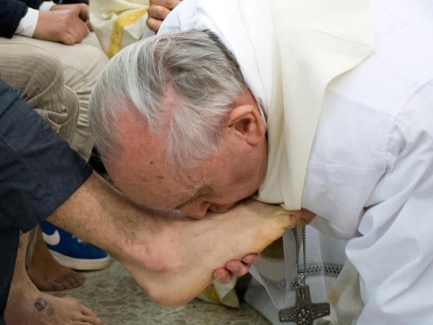 Pope Francis kisses the foot of an inmate at the juvenile detention center of Casal del Marmo, Rome, on March 28, 2013.