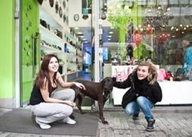 Ladies show Ruby, the anti-austerity dog, some love