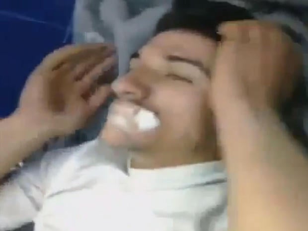 An image from a video posted on YouTube by Syrian opposition activists shows a man allegedly suffering symptoms of a chemical weapons attack