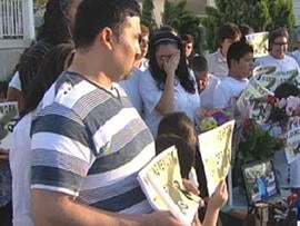 Family and friends of Ricardo Portillo hold vigil for him on front lawn of his Utah home on May 5, 2013 after soccer ref in rec league died from injuries suffered when he was punched in head by angry teen goalie