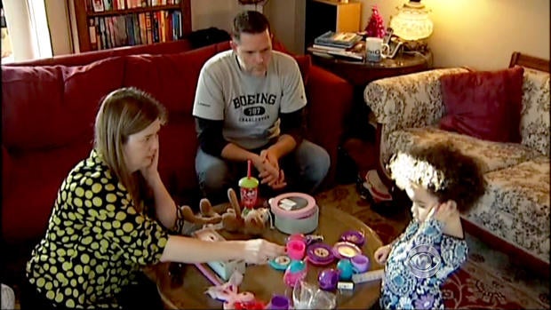 Matt and Melanie Capobianco with Veronica.
