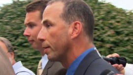 Sgt. Sean Murphy tells reporters â??life is goodâ?? as he walks into his hearing Tuesday.