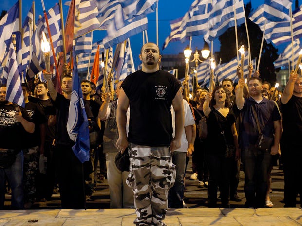 Members and supporters of the ultra-nationalist Golden Dawn party
