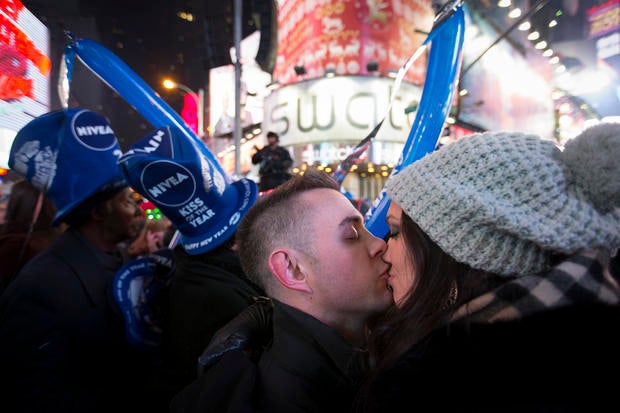 Rob Rudolph and Amanda Weaber share a kiss after midnight during the New Year's Eve celebrations in Times Square