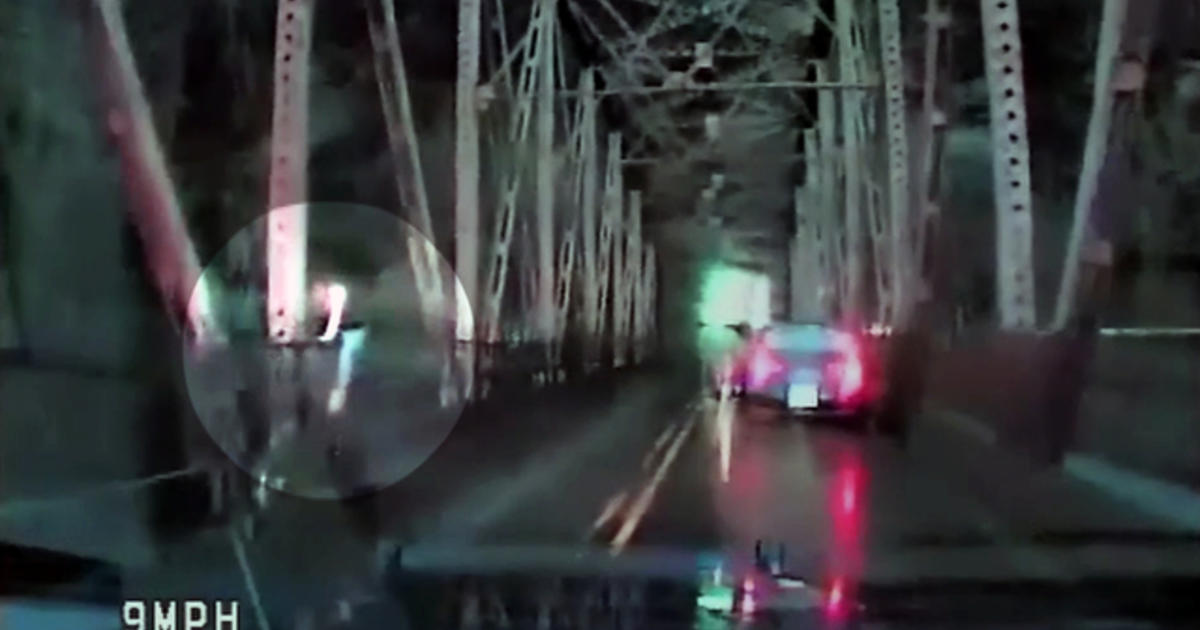 Woman jumps off bridge during police pursuit Videos CBS News