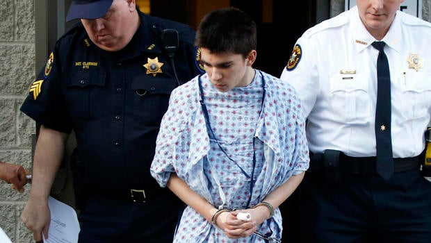 Alex Hribal, the suspect in the stabbings at the Franklin Regional High School near Pittsburgh, is taken from a district magistrate after he was arraigned on charges in the attack April 9, 2014, in Export, Pa.