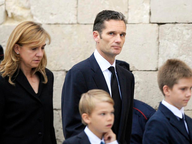 File photo shows Spain's Princess Cristina and her husband, former Olympic handball player Inaki Urdangarin and their family at funeral of his father in May 2012