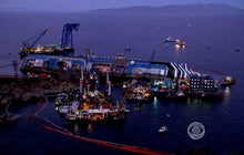 Crews begin slow, difficult task of righting Costa Concordia