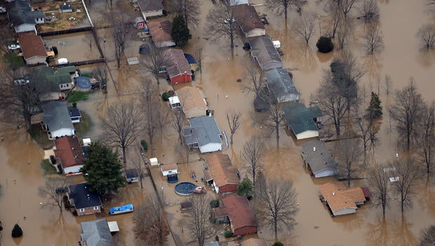 A neighborhood is submerged in floodwaters from the cresting Meremac River Dec. 31, 2015, in Arnold, Missouri. The St. Louis area and surrounding region are experiencing record flood crests of the Mississippi, Missouri and Meremac rivers after days of rec