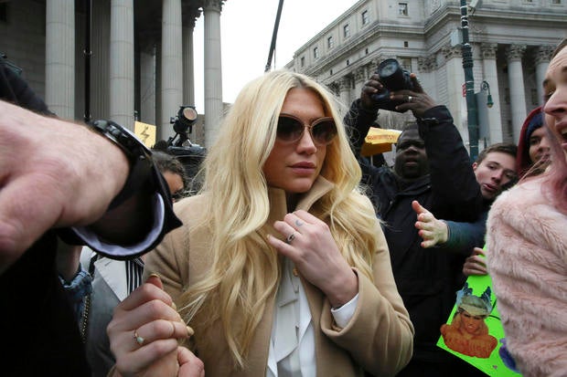 Pop star Kesha leaves Supreme Court in New York on Feb. 19, 2016 after losing bid to be freed from recording contract with Dr. Luke
