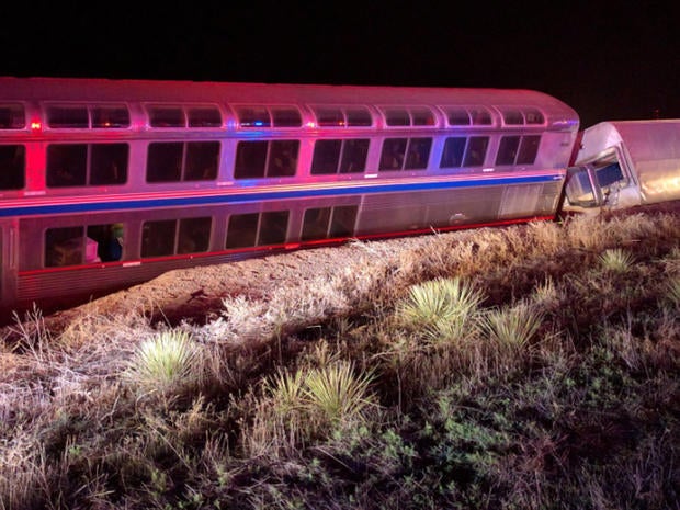 Two of five Amtrak train cars that derailed west of Dodge City, Kansas early on March 14, 2016 are seen in photo provided to CBS News by a passenger