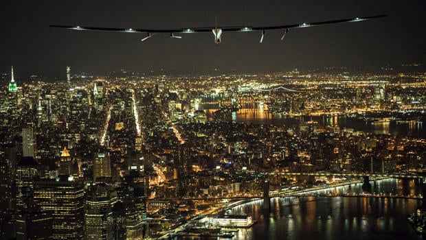 Solar Impulse 2, the solar airplane piloted by Swiss adventurer Andre Borschberg, flies over Manhattan on June 11, 2016, shortly before landing at John F. Kennedy airport.