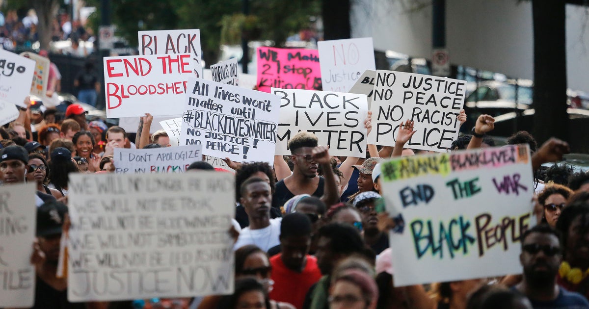 Thousands march against police violence across US - CBS News