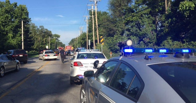 Police: Ohio man kills neighbor at school bus stop amid long-running feud - CBS News
