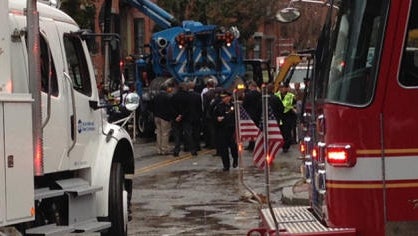 Boston water main floods trench, killing 2 workers