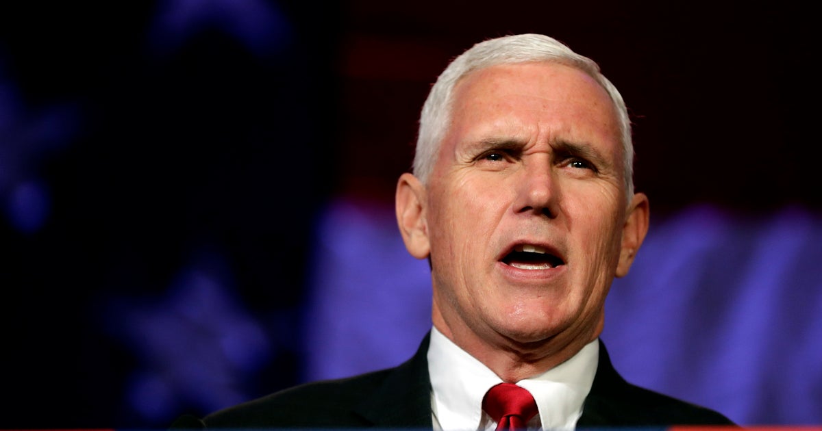 Mike Pence visits memorials of slain Iowa police officers - CBS News