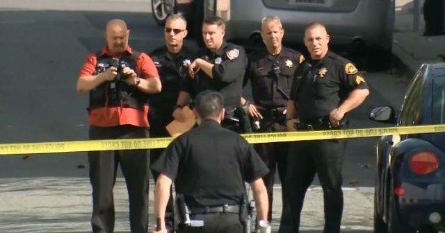 Police: Woman runs down husband outside Calif. court, jumps to her death - CBS News