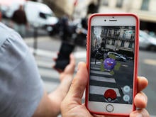 pokemon-go-paris-getty-583521326.jpg