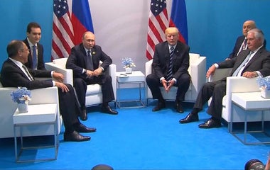 Amid Russia uproar, Trump tells reporters his son is a "good boy"