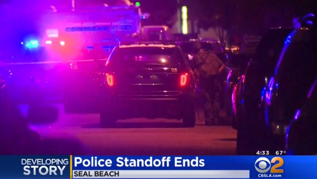 SWAT officers storm apartment after standoff, find 2 dead SWAT officers storm apartment after standoff, find 2 dead