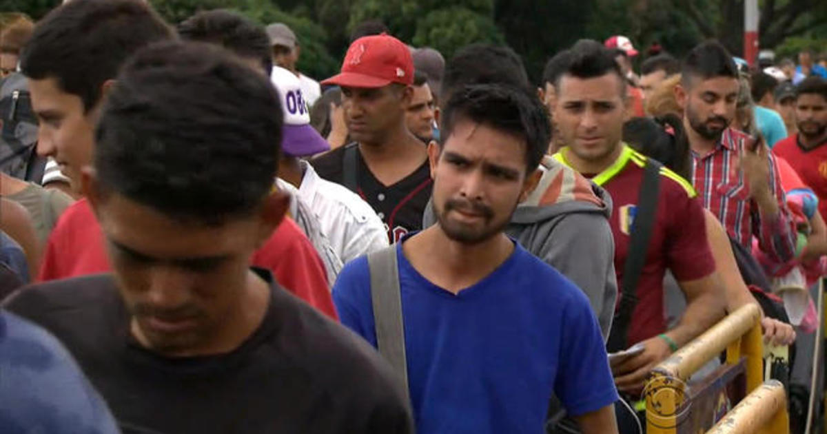Venezuelans cross Colombia border in search of new life