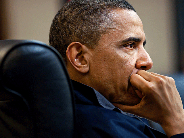 this image released by the White House, President Barack Obama makes a point during one in a series of meetings in the Situation Room of the White House discussing the mission against Osama bin Laden, Sunday, May 1, 2011. National Security Adviser Tom Don 