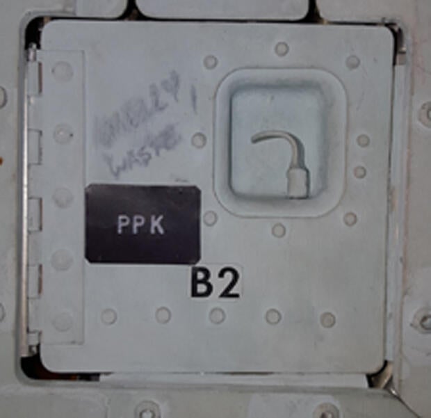 apollo-11-capsule-smelly-waste-sign.jpg