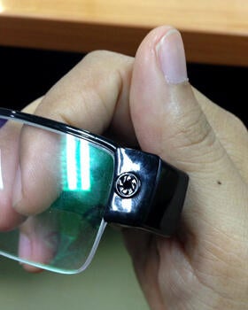 A set of glasses with a hidden camera used by students caught cheating in exams for admission to medical and dental faculties in Bangkok