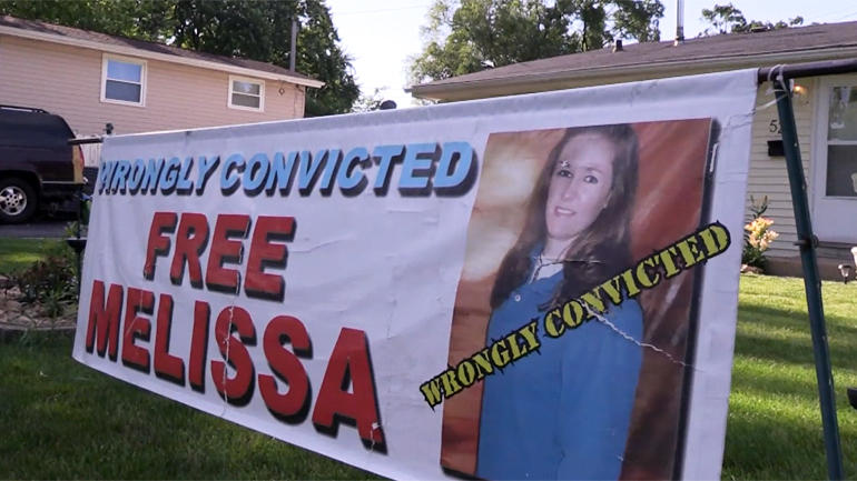 "Free Melissa Calusinski" sign 