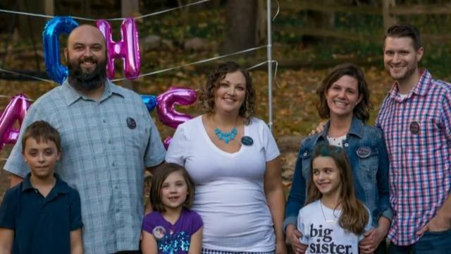 Couple forced to adopt biological babies born through surrogacy 