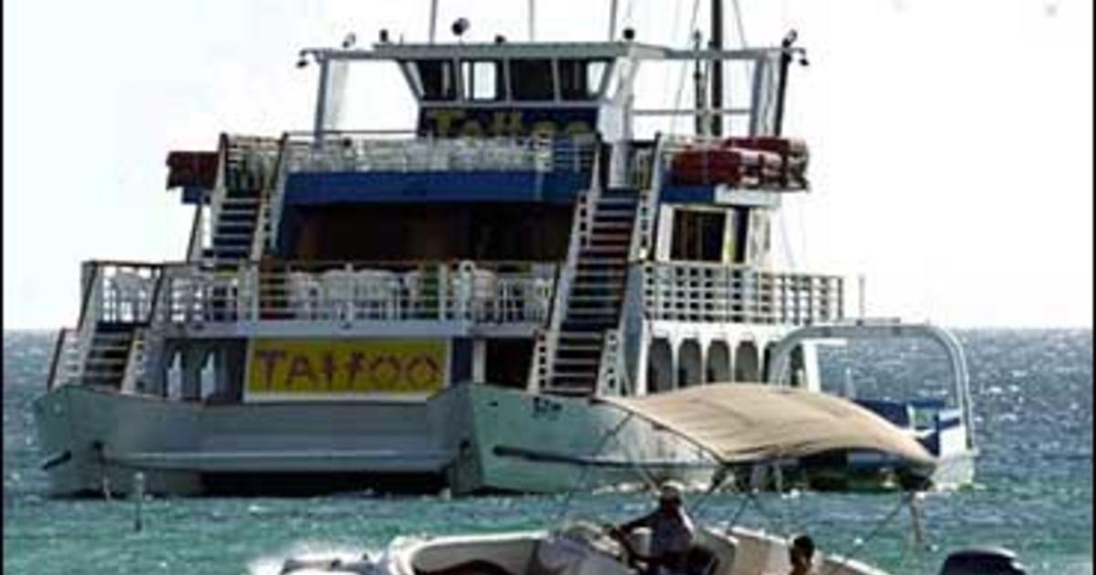 aruba party boat dj arrested - cbs news